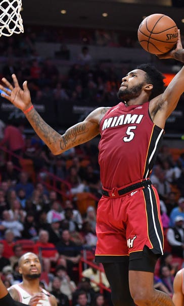 Goran Dragic stuffs stat sheet in Whiteside's return, Heat beat Trail Blazers 122-111